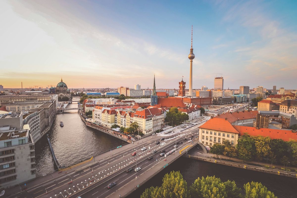 Berlin's TV tower above the river and rooftops on a clear day